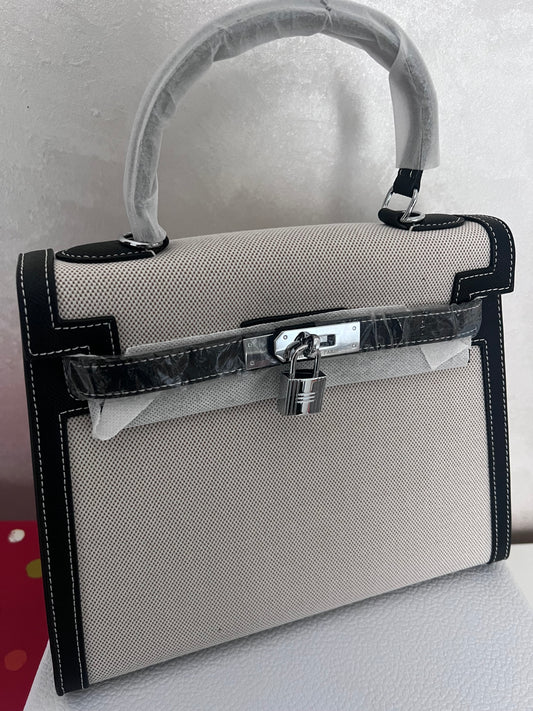 Sac hermes fermeture argentée